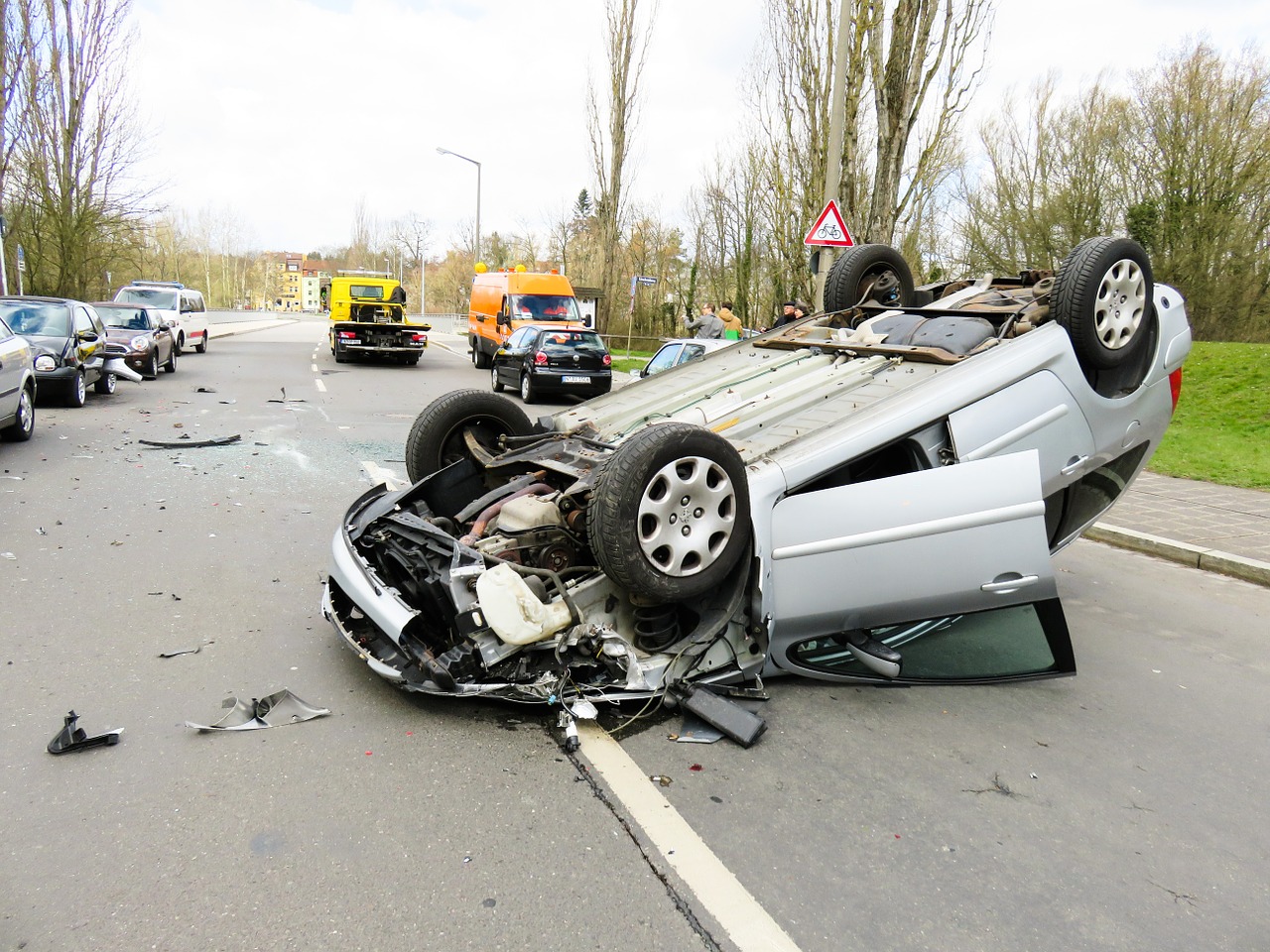 Overturned Car Waiting On An Accident Recovery Unit