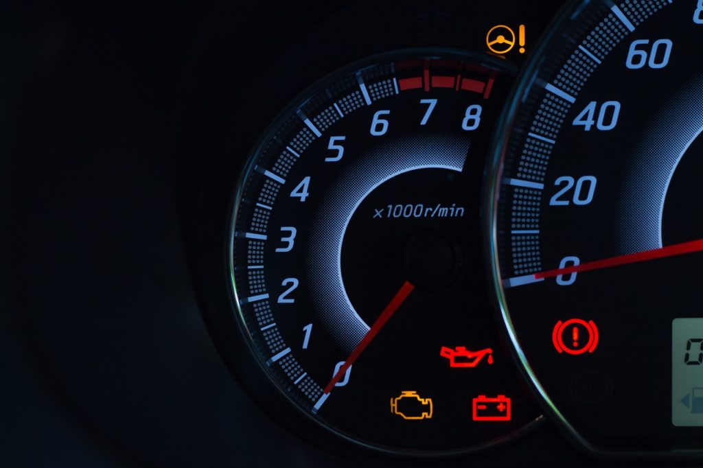Dashboard Panel On A Modern Car With Warning Lights